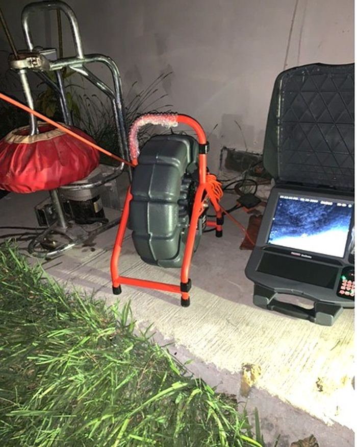 Sewer camera inspection rig and monitor set up at a cleanout